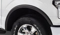 Bushwacker Ford Fender Flares Ford OE Style Fender Flare Front Pair Front Pair of Ford OE Style Fender Flares for the 2015 F-150. Note: Does not fit Raptor models door molding removal on bed and front fender required for fitment on Platinum model. Pa