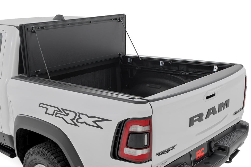 Rough Country Hard Tri-Fold Flip Up Fold Bed Cover 5 ft7 Inch Bed Ram 1500 19-26 1500 TRX 21-24
