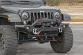 Rough Country full-width front winch bumper with LED light bar on Jeep Wrangler